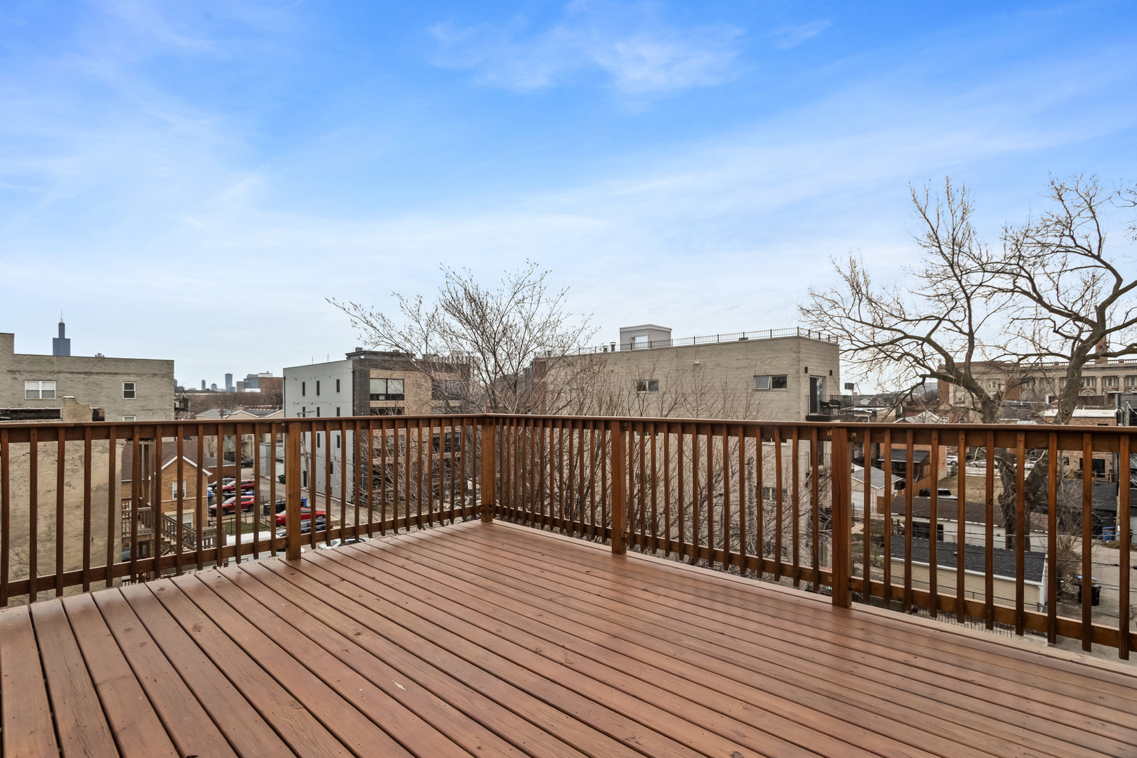 2247 West Monroe Street, Unit 3 Chicago, IL 60612 - Photo 28 of 31 a view of a balcony with wooden floor