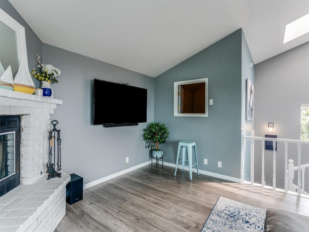 554 Cambridge Street Cambria, CA 93428 - Photo 12 of 52 a living room with furniture and a flat screen tv