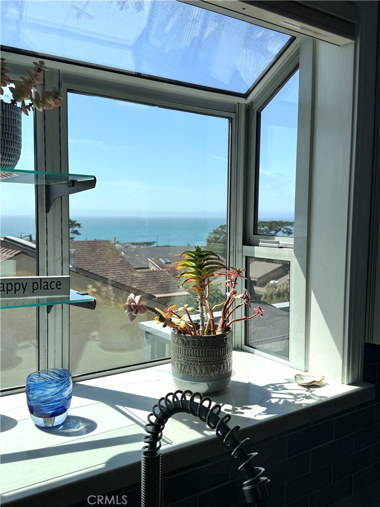 554 Cambridge Street Cambria, CA 93428 - Photo 19 of 52 a view of table and chair