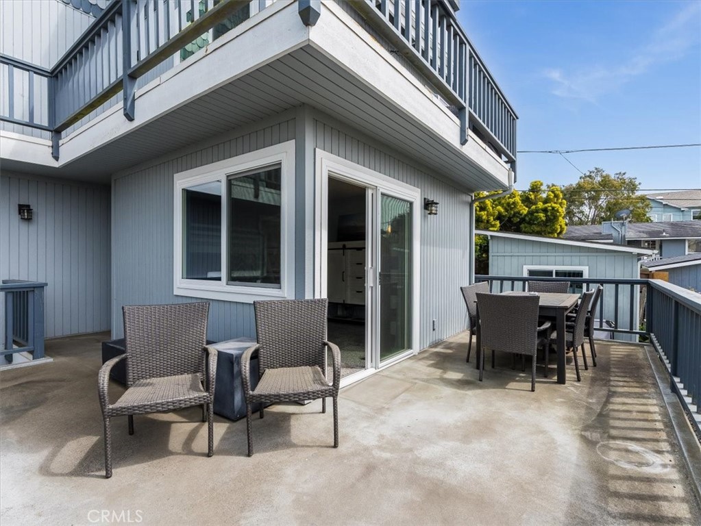 554 Cambridge Street Cambria, CA 93428 - Photo 21 of 52 Ocean View deck off the kitchen/dining and living room.