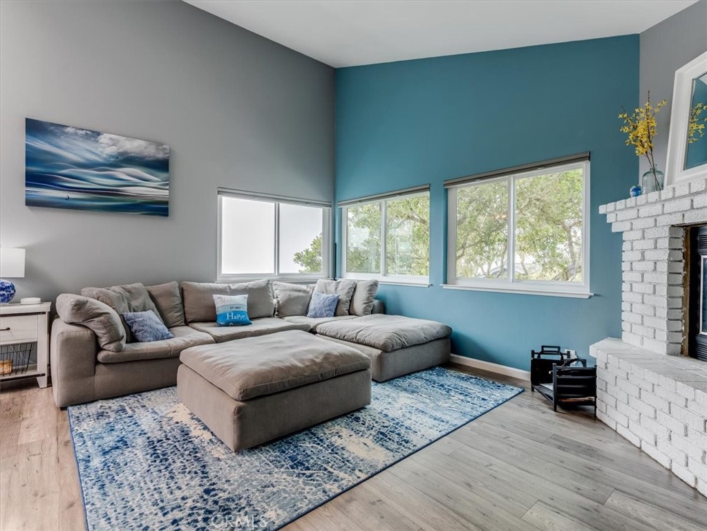 554 Cambridge Street Cambria, CA 93428 - Photo 9 of 52 a living room with furniture and a flat screen tv