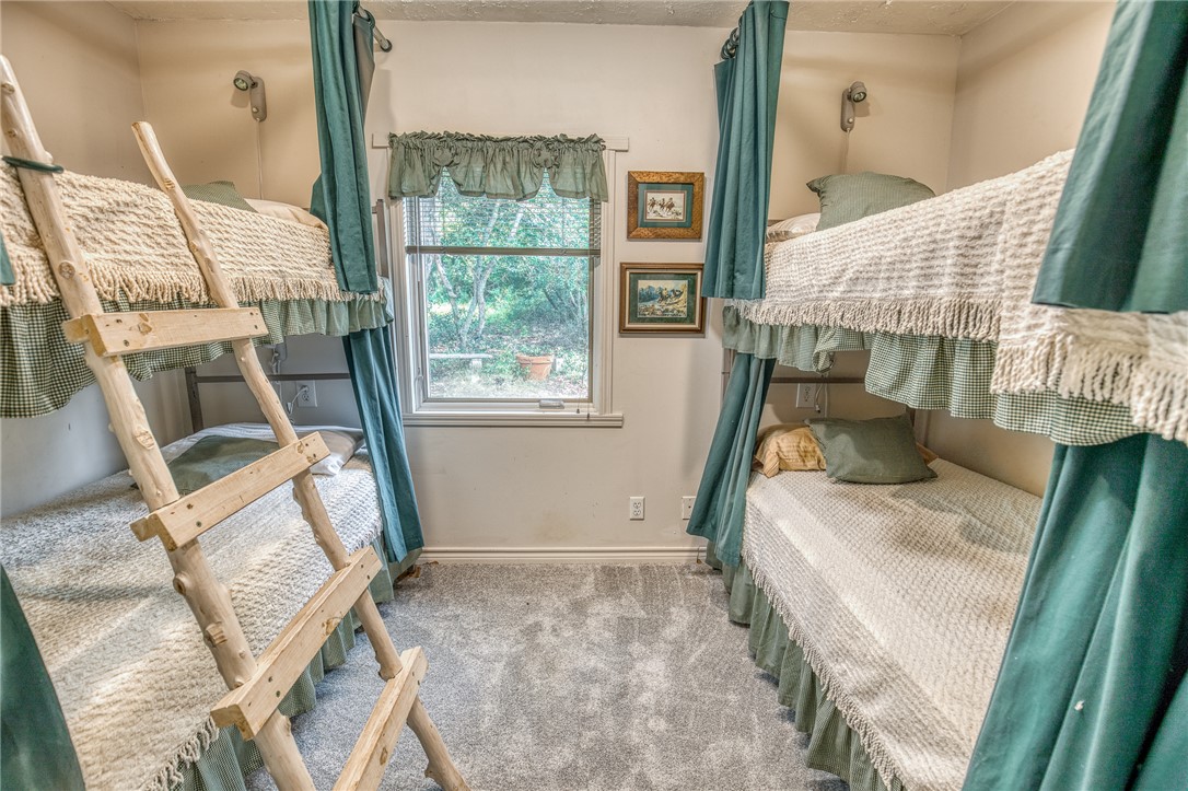 2330 County Road 329 Milano, TX 76556 - Photo 11 of 45 a bed room with a bed and a window