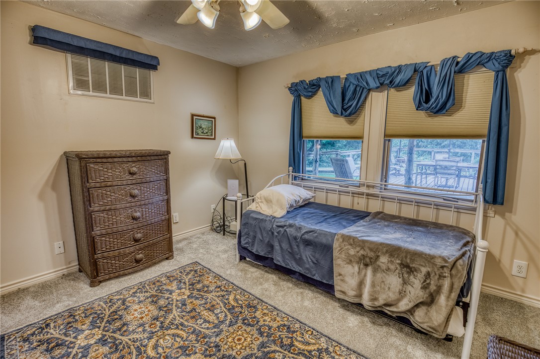 2330 County Road 329 Milano, TX 76556 - Photo 12 of 45 a bedroom with a bed and a window