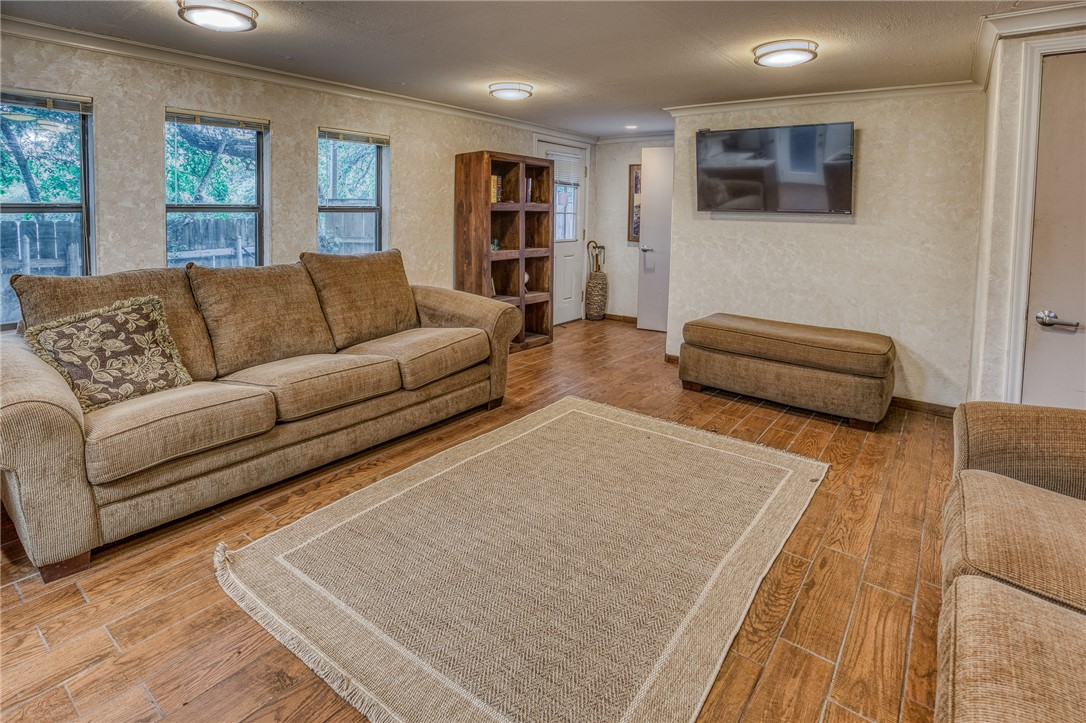 2330 County Road 329 Milano, TX 76556 - Photo 16 of 45 a living room with furniture and a couch