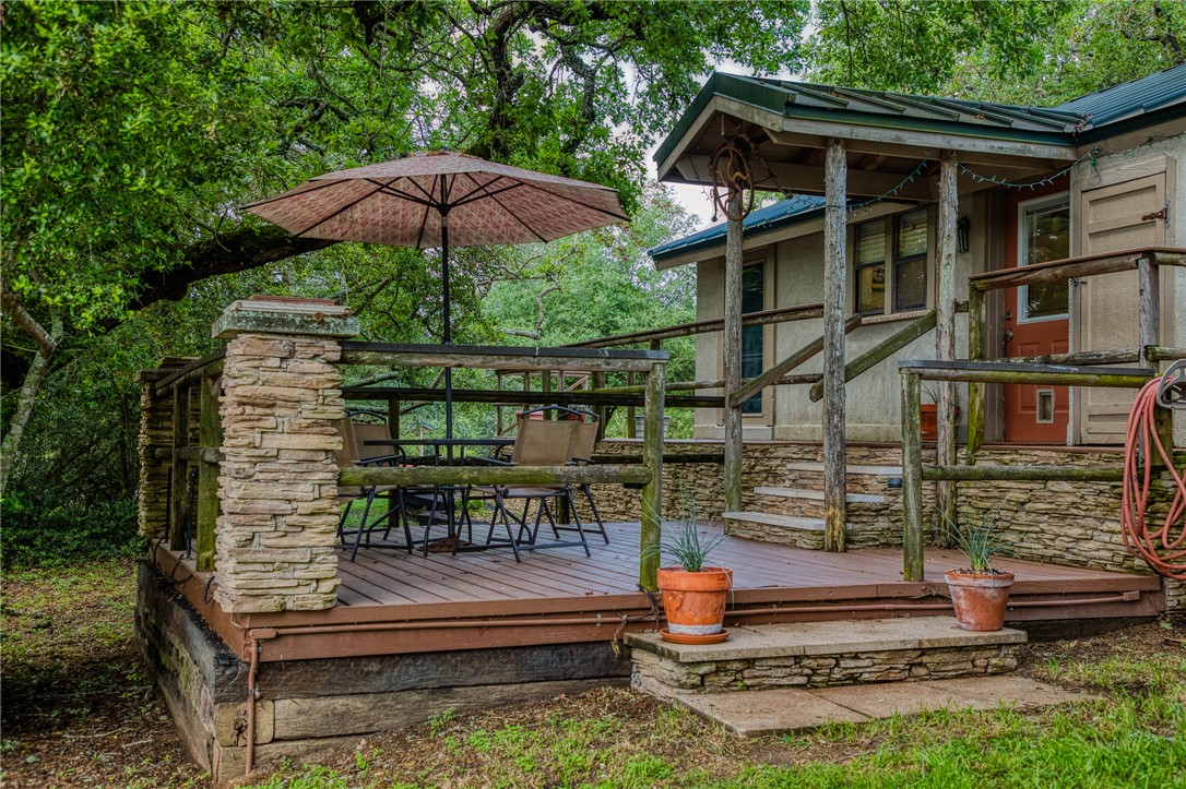 2330 County Road 329 Milano, TX 76556 - Photo 21 of 45 a backyard of a house with outdoor seating
