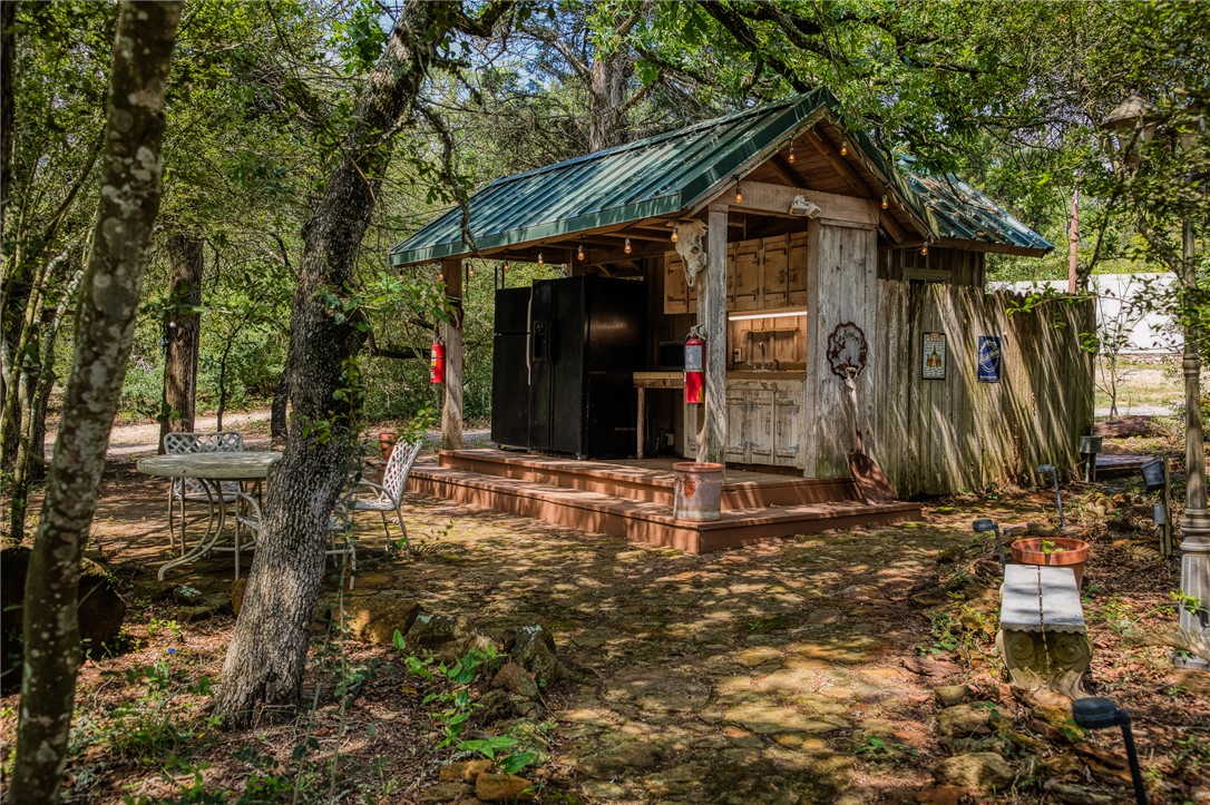 2330 County Road 329 Milano, TX 76556 - Photo 28 of 45 a view of a small house with yard