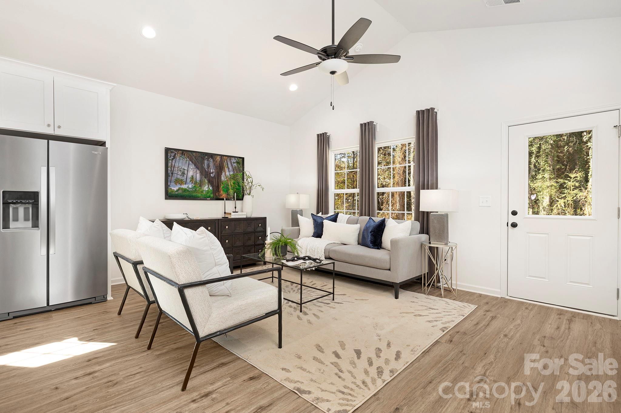 224 Rhyne Station Road Charlotte, NC 28214 - Photo 4 of 17 a living room with furniture and a window