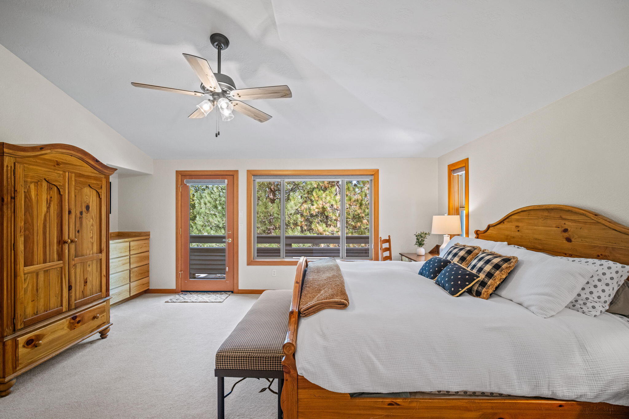 17948 Shadow Lane, Unit 7 Sunriver, OR 97707 - Photo 39 of 92 a bed sitting in a bedroom next to a window