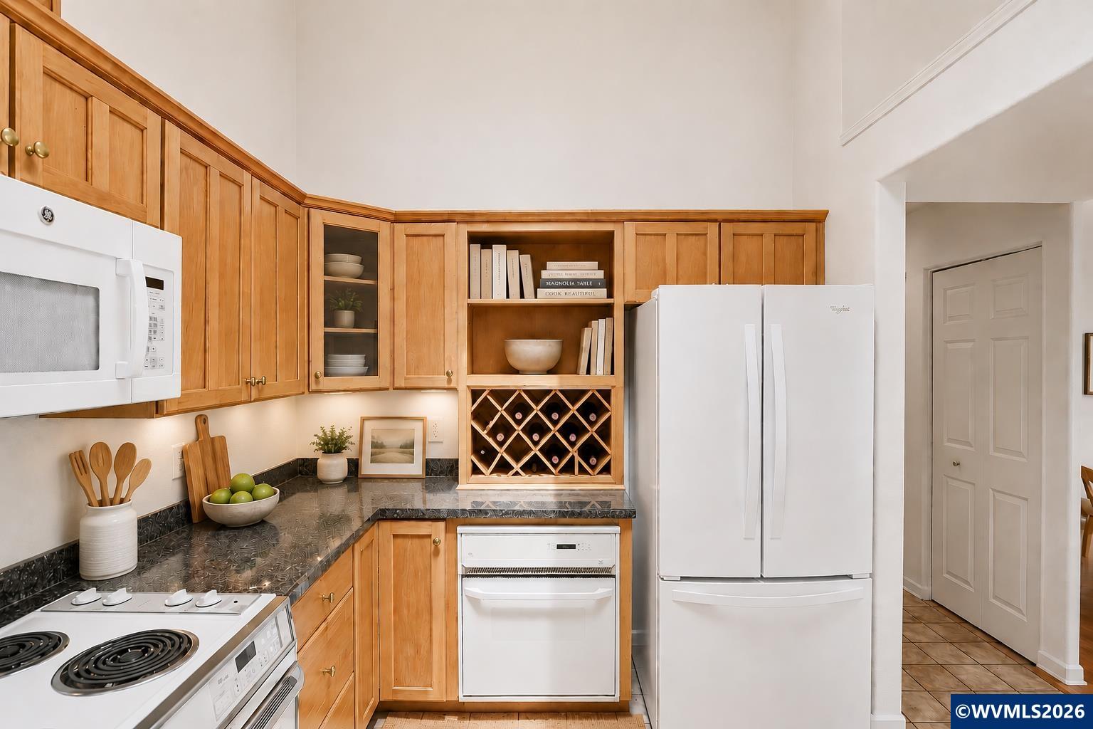 1299 Twin Hills Road Southeast Jefferson, OR 97352 - Photo 20 of 47 a kitchen with a refrigerator and a sink