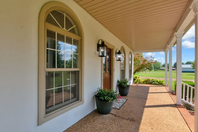 a bathroom with a double vanity sink and mirror