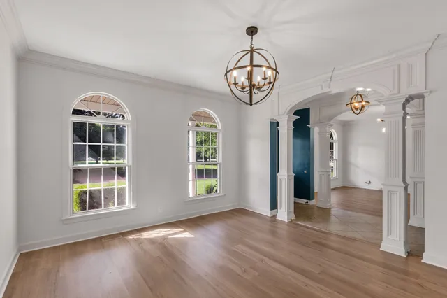 a view of entryway with wooden floor