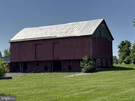8212 Sixes Bridge Road Keymar, MD 21757 - Photo 3 of 3 a house view with a garden space