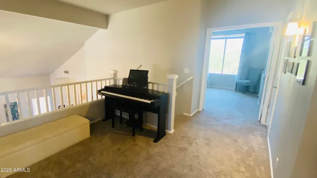 a view of a hallway with windows