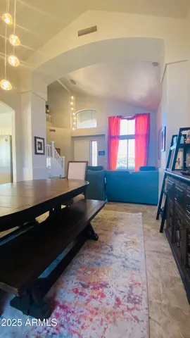 a view of a living room and dining room