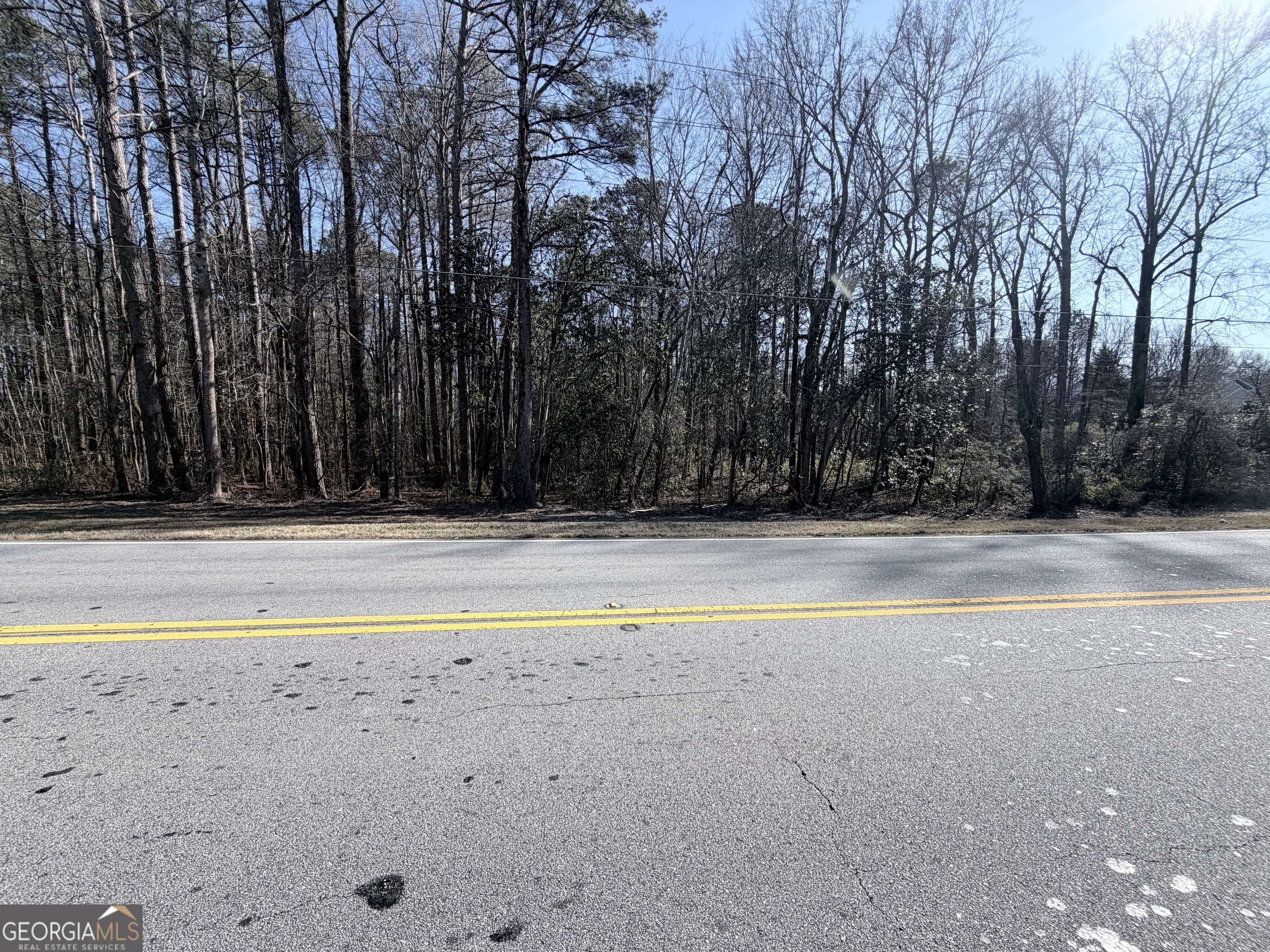 1272 Old Loganville Road Southwest Loganville, GA 30052 - Photo 16 of 18 a view of swimming pool with an outdoor space and seating area