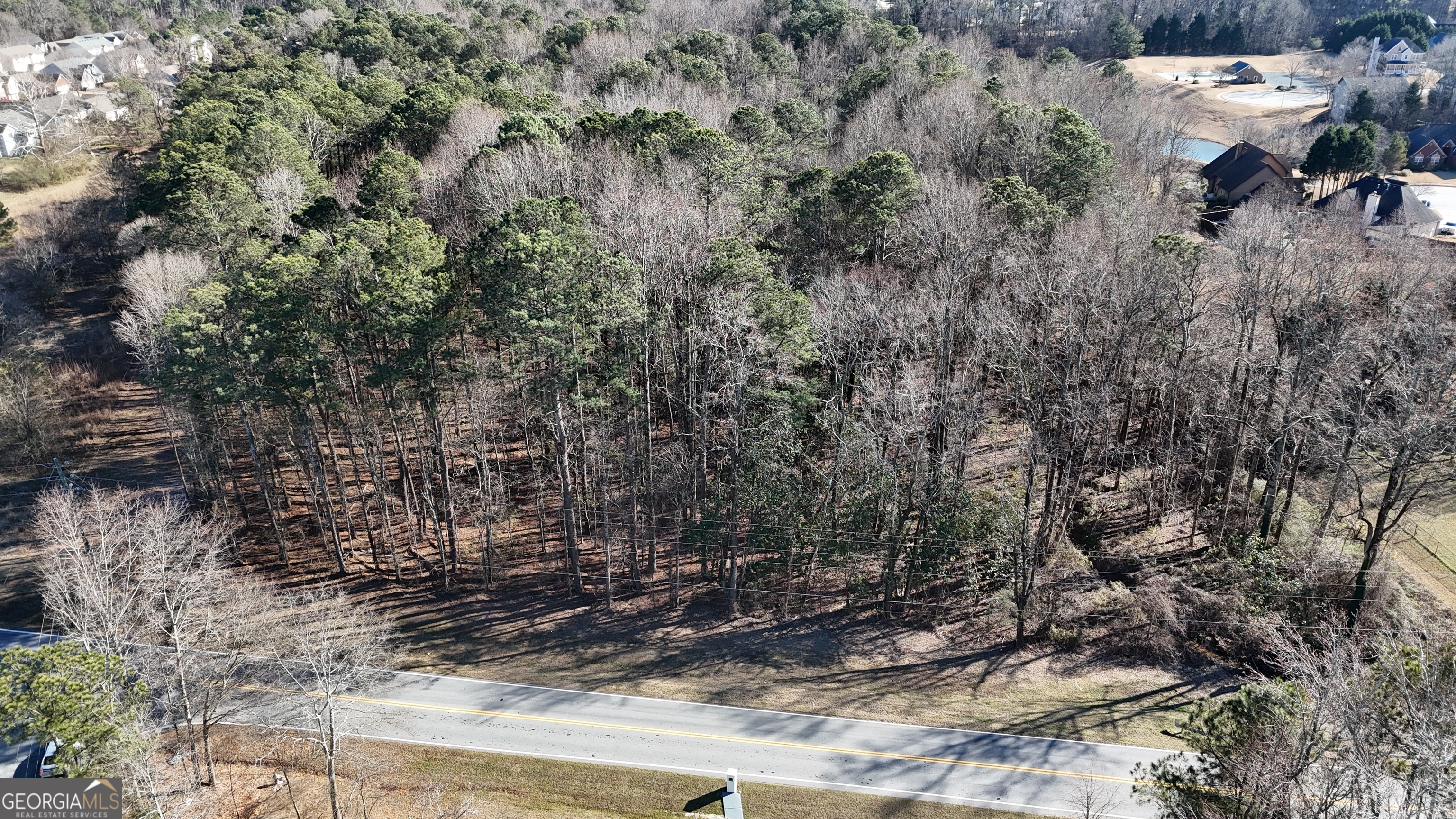 1272 Old Loganville Road Southwest Loganville, GA 30052 - Photo 2 of 18 a view of a backyard of the house