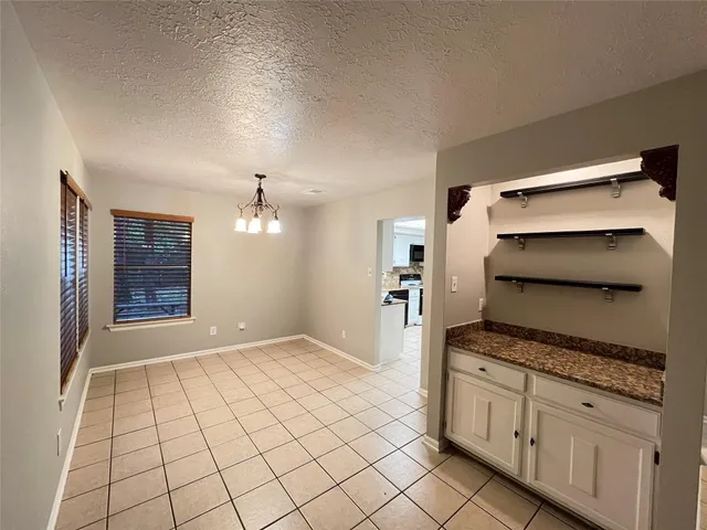 a view of a livingroom with a chandelier