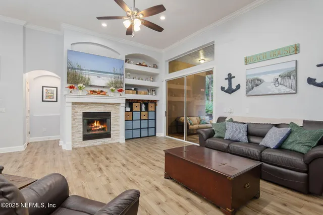 a kitchen with granite countertop a sink stove and refrigerator