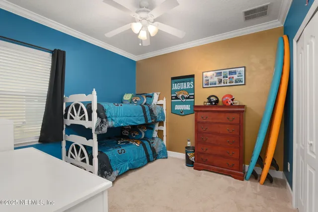 a backyard of a house with fire pit and outdoor seating