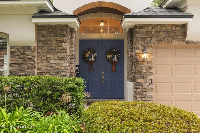 a view of a entryway door front of house