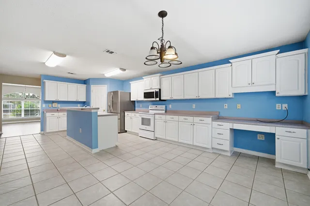 a view of a tree in a yard