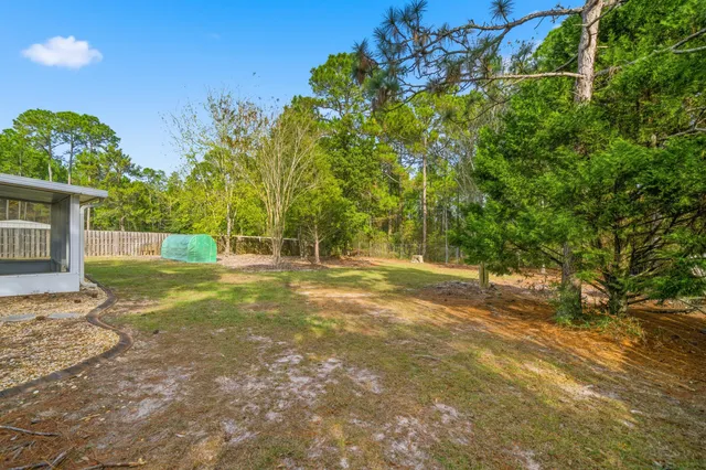 a workspace with furniture window and wooden floor
