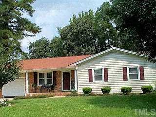 4005 Live Oak Road Raleigh, NC 27604 - Photo 1 of 1 a view of a house with a yard and plants