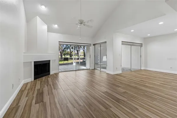 a front view of a house with plants