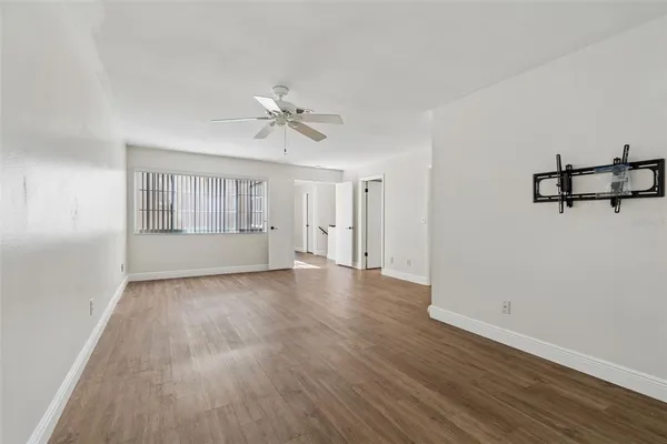 a view of entryway with wooden floor