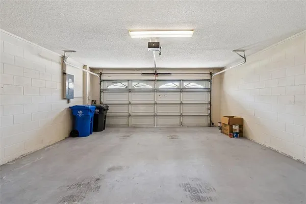 a view of a hallway with wooden floor and closet