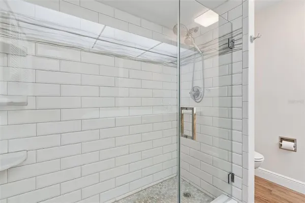 a view of a house with swimming pool in front of it