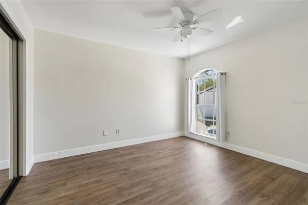 an aerial view of residential house with outdoor space and trees