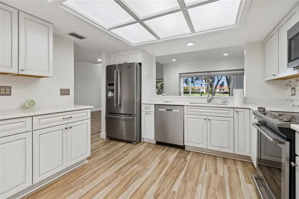 a view of livingroom with wooden floor