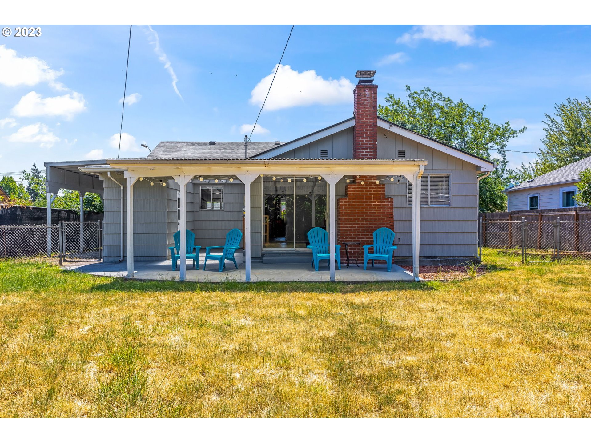 2290 E Street Springfield, OR 97477 - Photo 36 of 45 a view of a house with a swimming pool