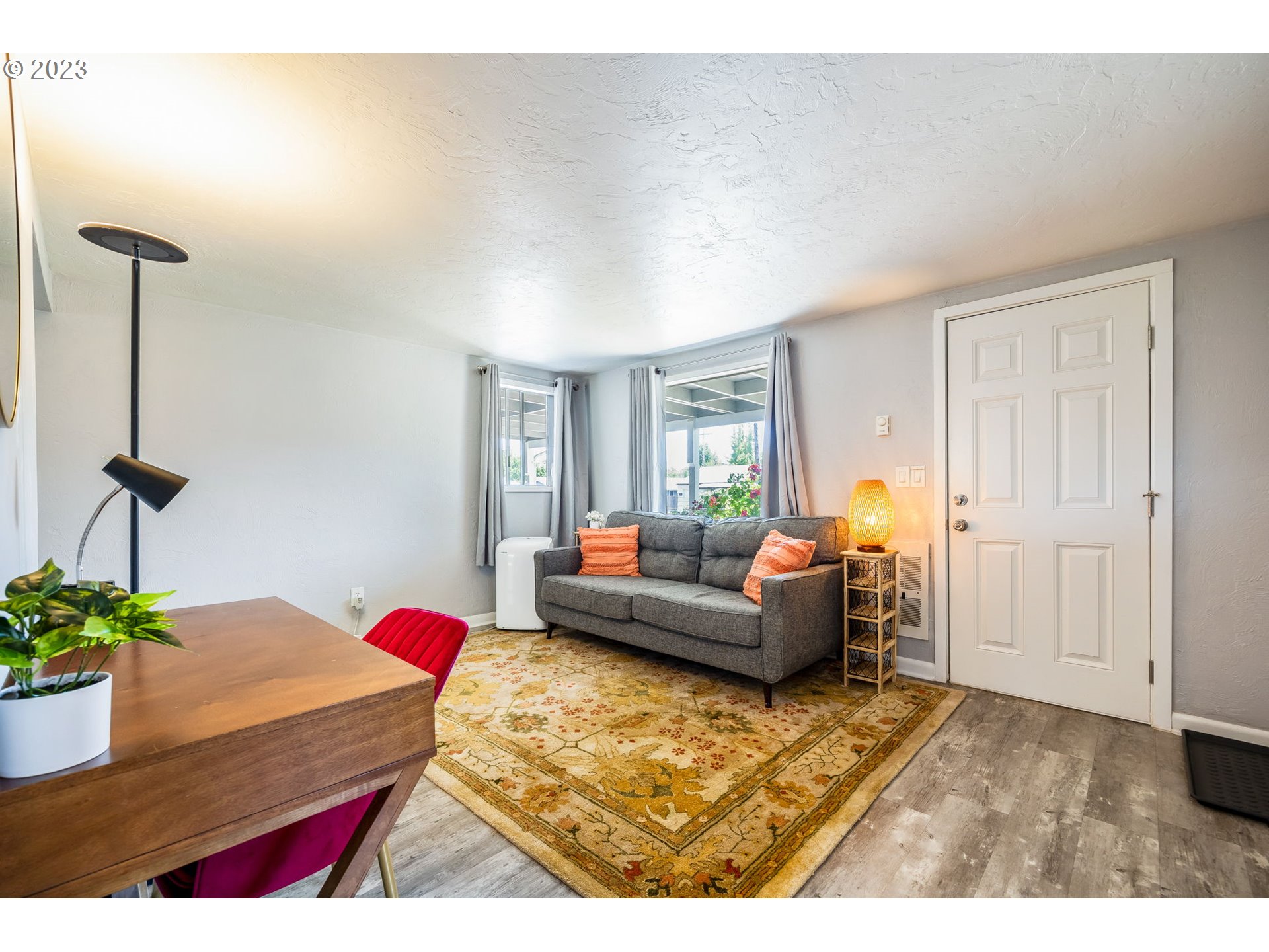 2290 E Street Springfield, OR 97477 - Photo 5 of 45 a living room with furniture and a potted plant
