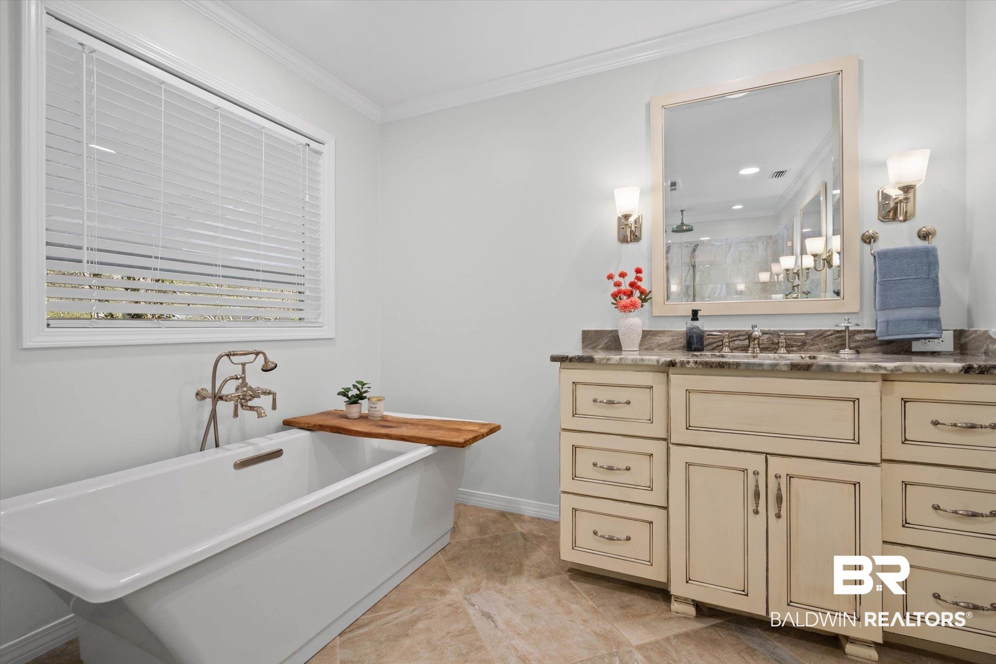 31369 Blakeley Way Daphne, AL 36527 - Photo 10 of 38 Full bath featuring vanity, crown molding, a tile shower, and a freestanding bath