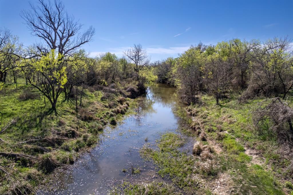 Tbd Old Burkett Road Coleman, TX 76834 - Photo 2 of 29 a view of a lake with a yard