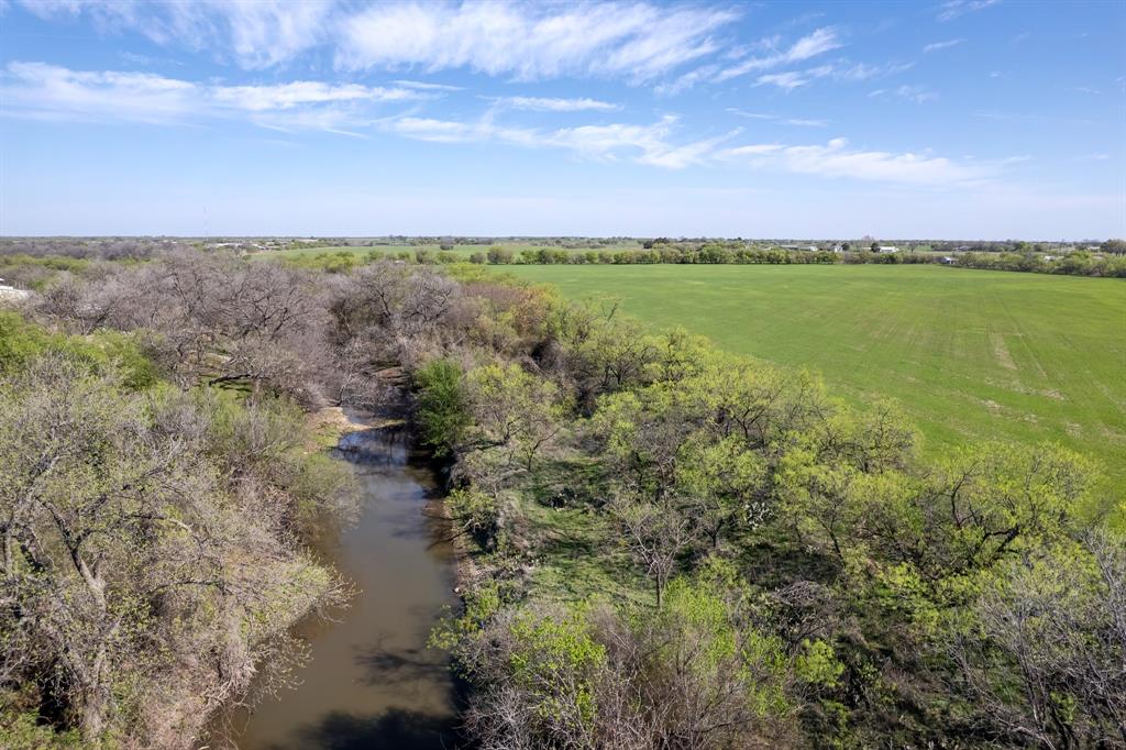 Tbd Old Burkett Road Coleman, TX 76834 - Photo 7 of 29 a view of a lake with a house