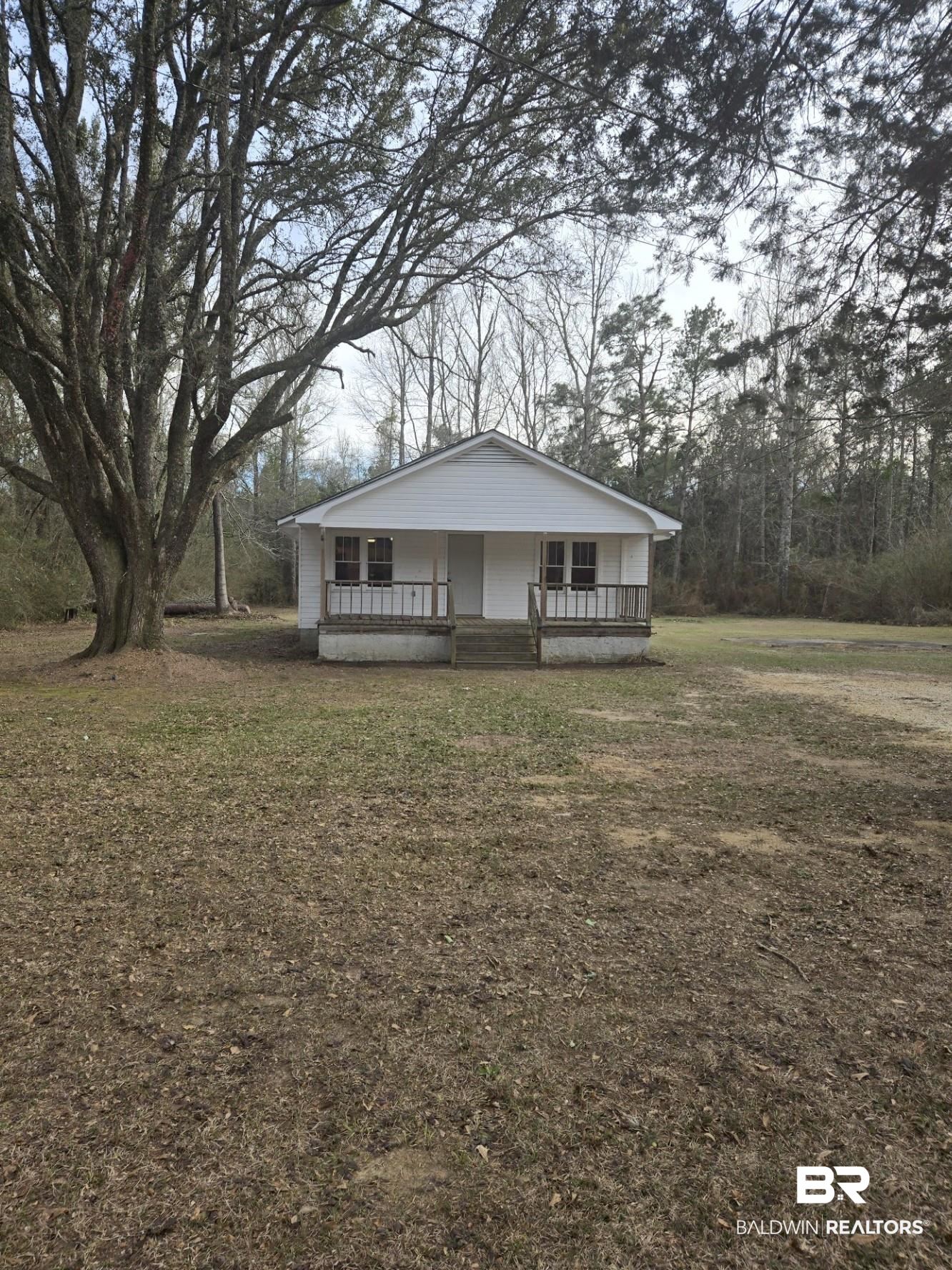 16360 Tolbert Road Bay Minette, AL 36507 - Photo 1 of 14 Bungalow featuring covered porch and a front yard