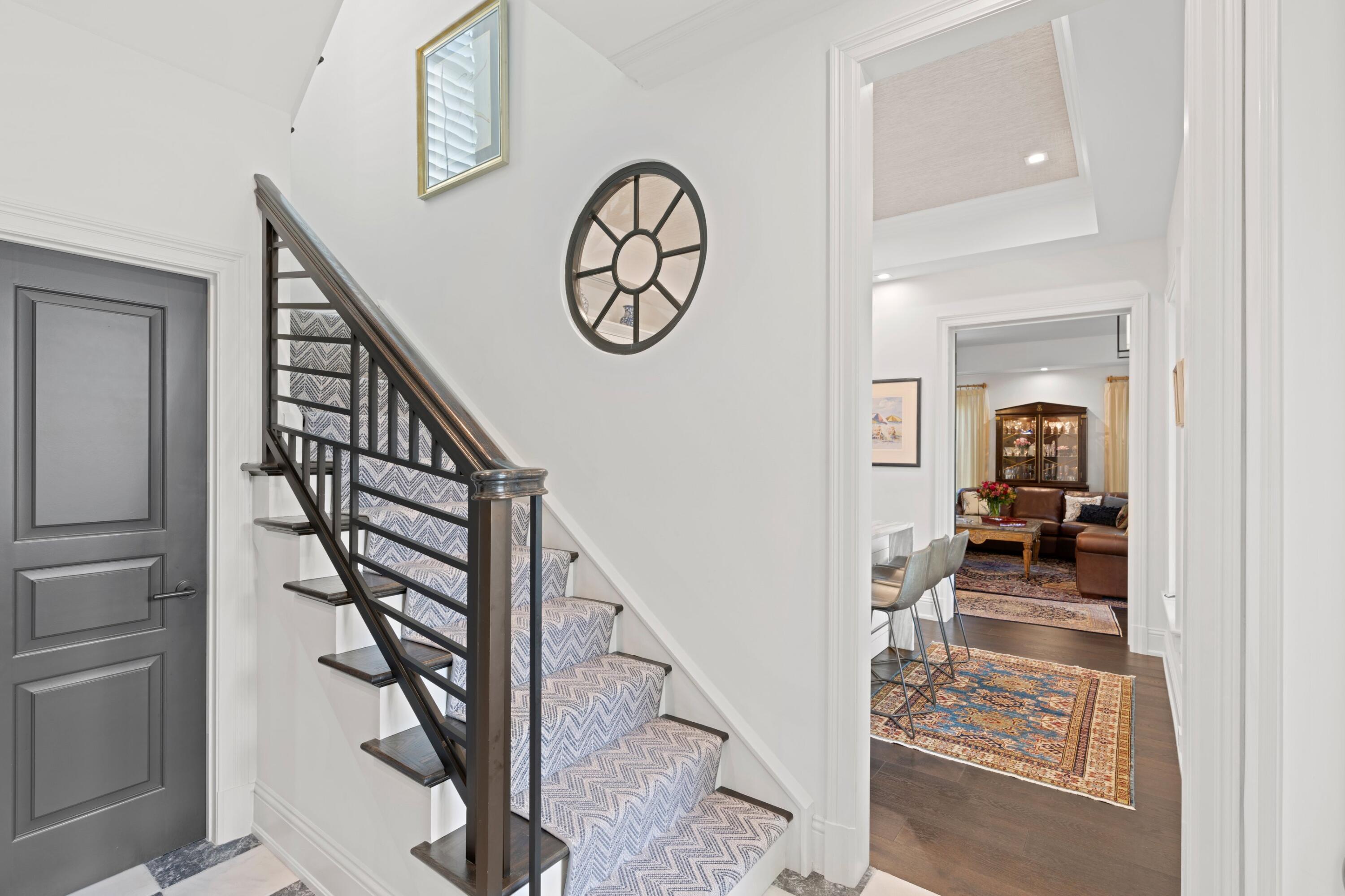 533 Westwood Road West Palm Beach, FL 33401 - Photo 20 of 43 a view of a hallway with wooden floor and entryway