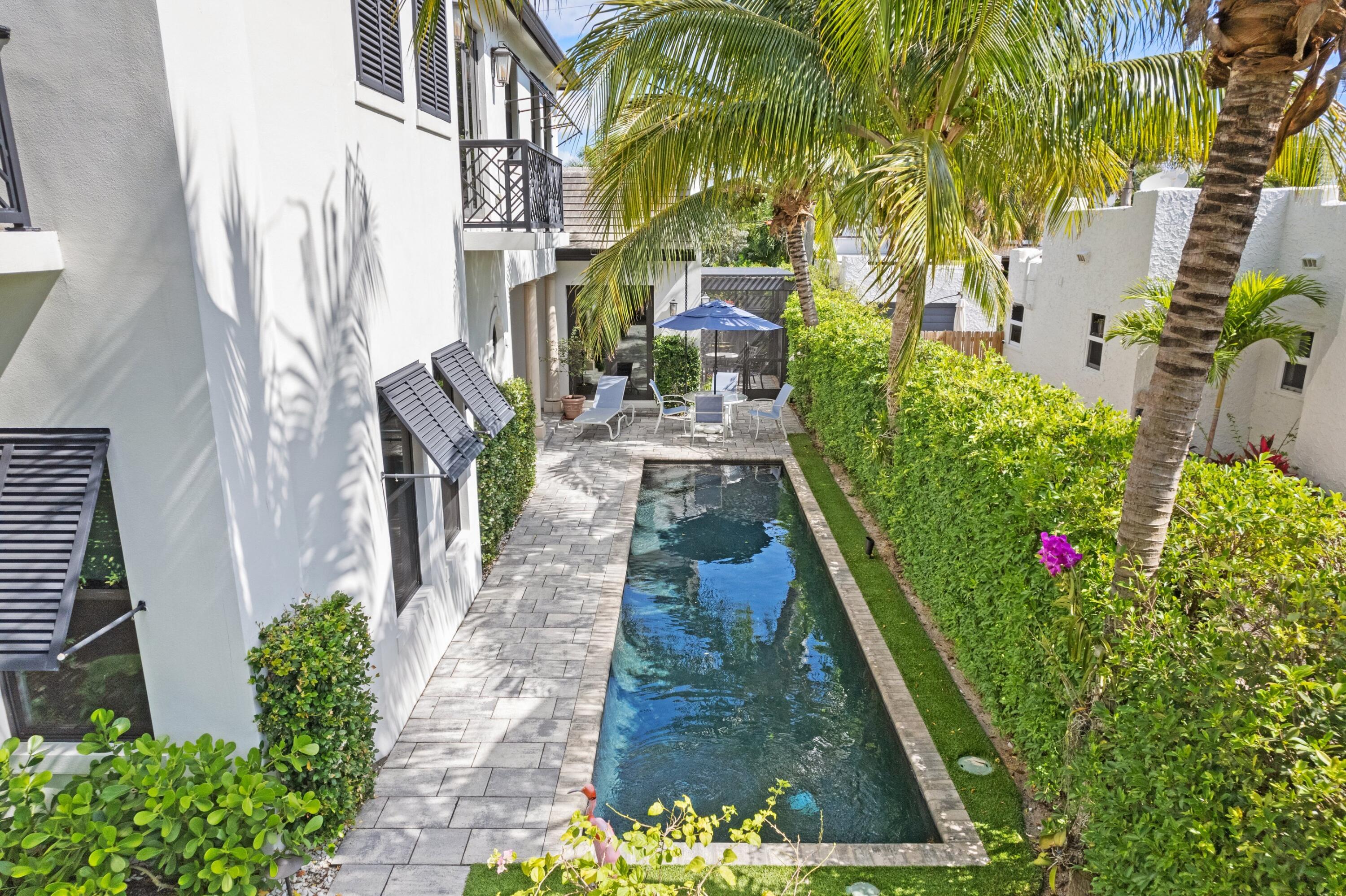 533 Westwood Road West Palm Beach, FL 33401 - Photo 2 of 43 a view of pathway in front of building