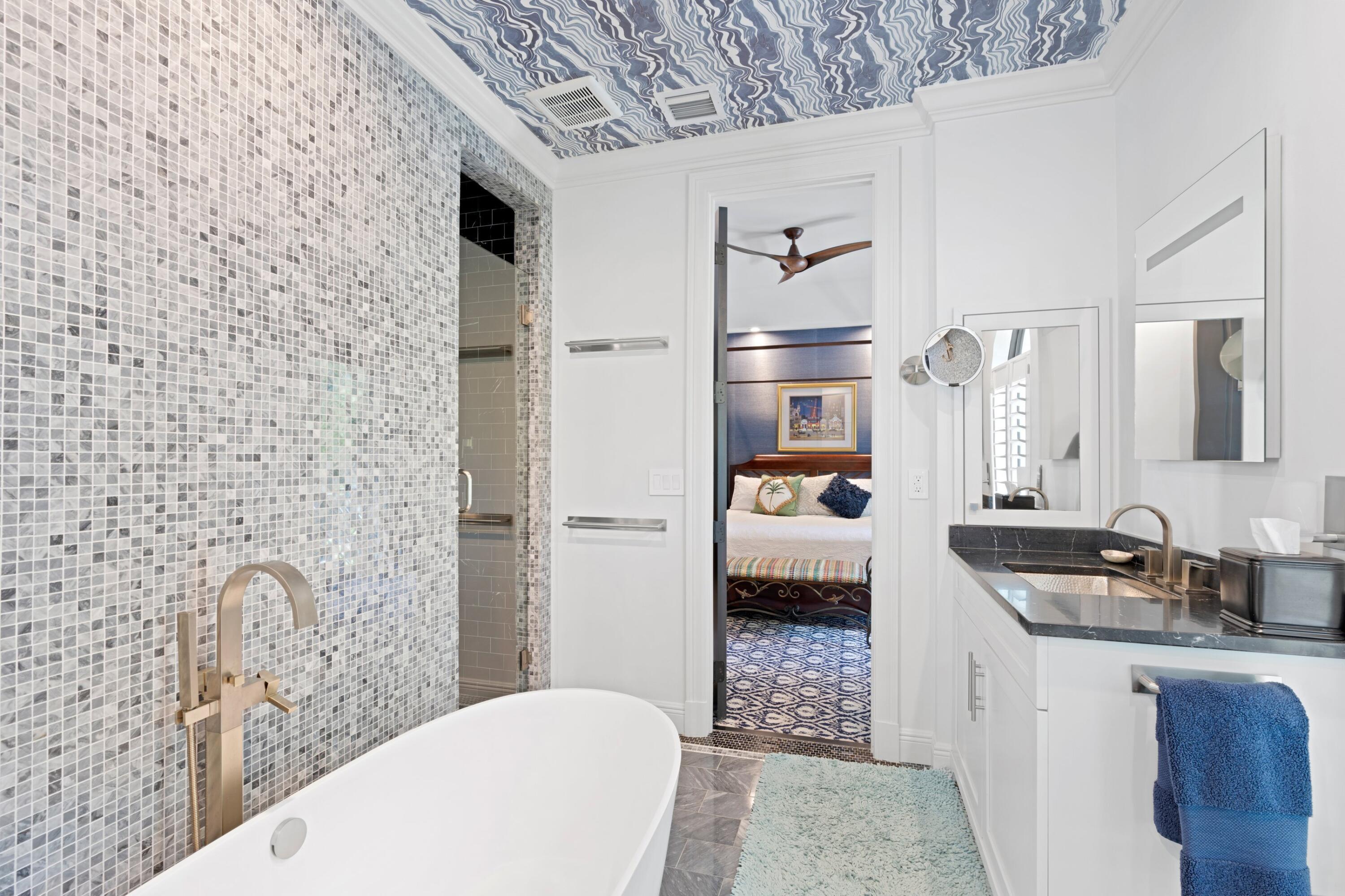 533 Westwood Road West Palm Beach, FL 33401 - Photo 23 of 43 a bathroom with a sink a toilet and shower