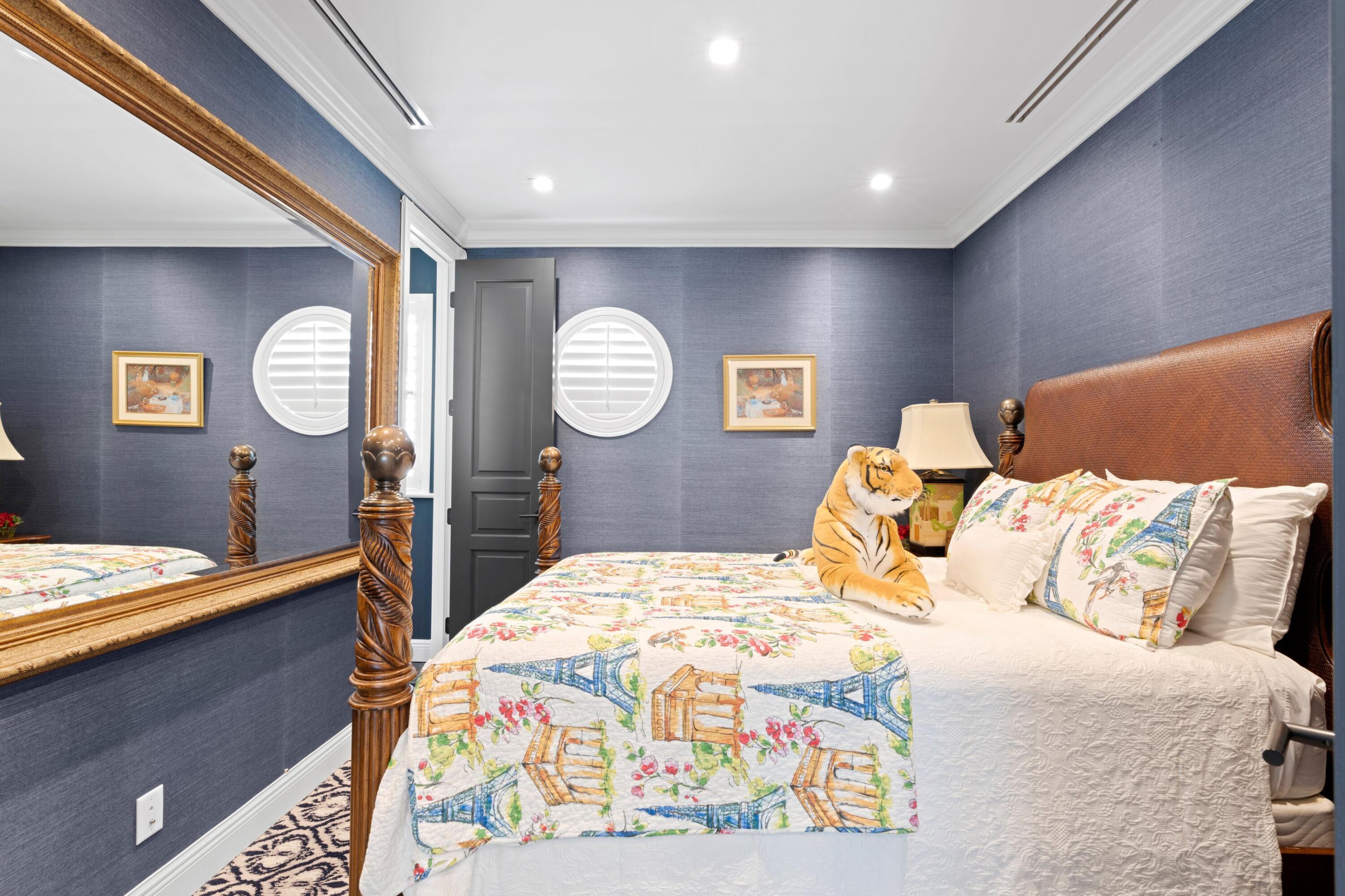 533 Westwood Road West Palm Beach, FL 33401 - Photo 26 of 43 a bedroom with a large bed and a window