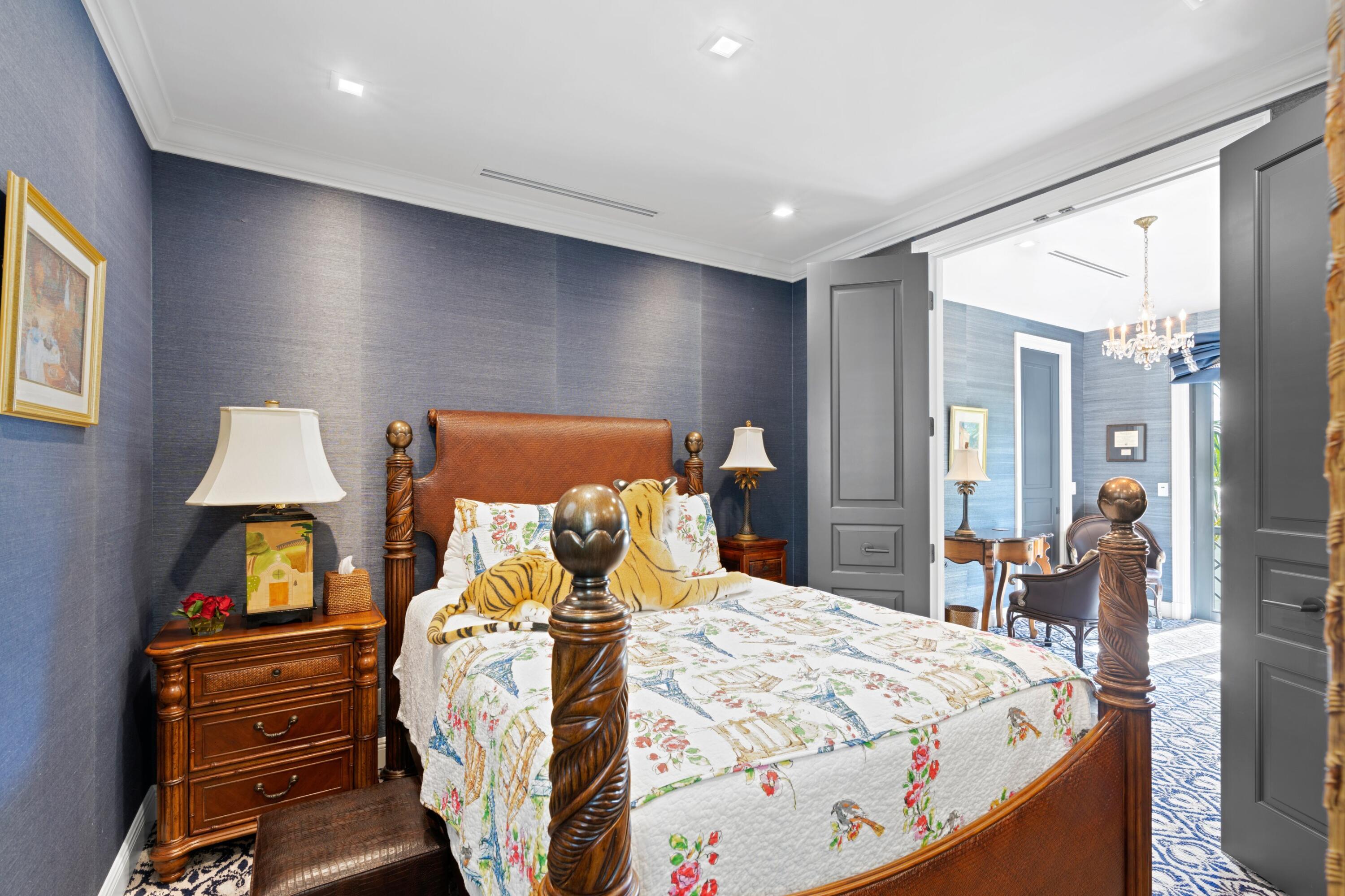 533 Westwood Road West Palm Beach, FL 33401 - Photo 27 of 43 a bedroom with a bed and wooden floor
