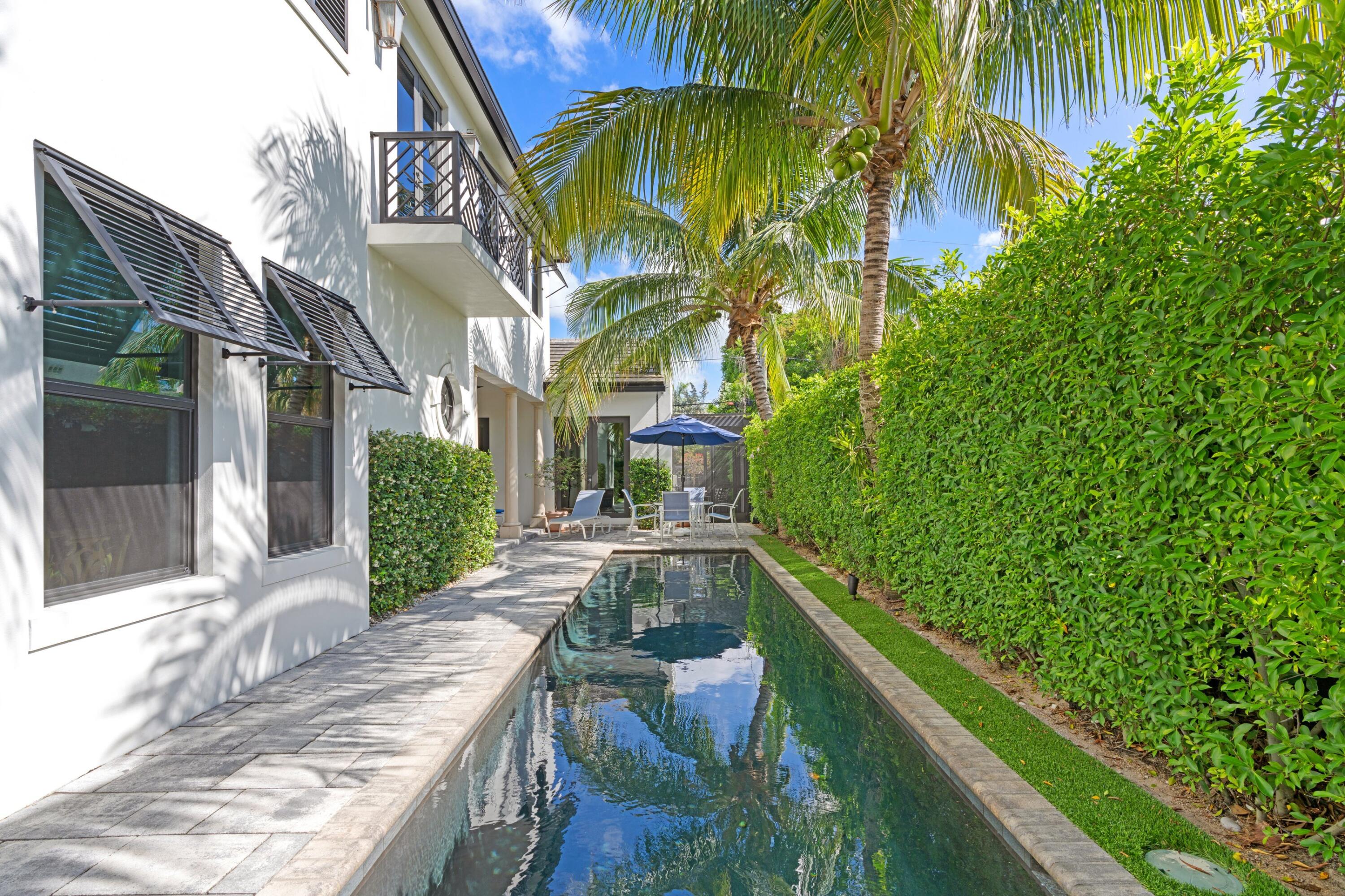533 Westwood Road West Palm Beach, FL 33401 - Photo 4 of 43 a balcony with trees in front of it
