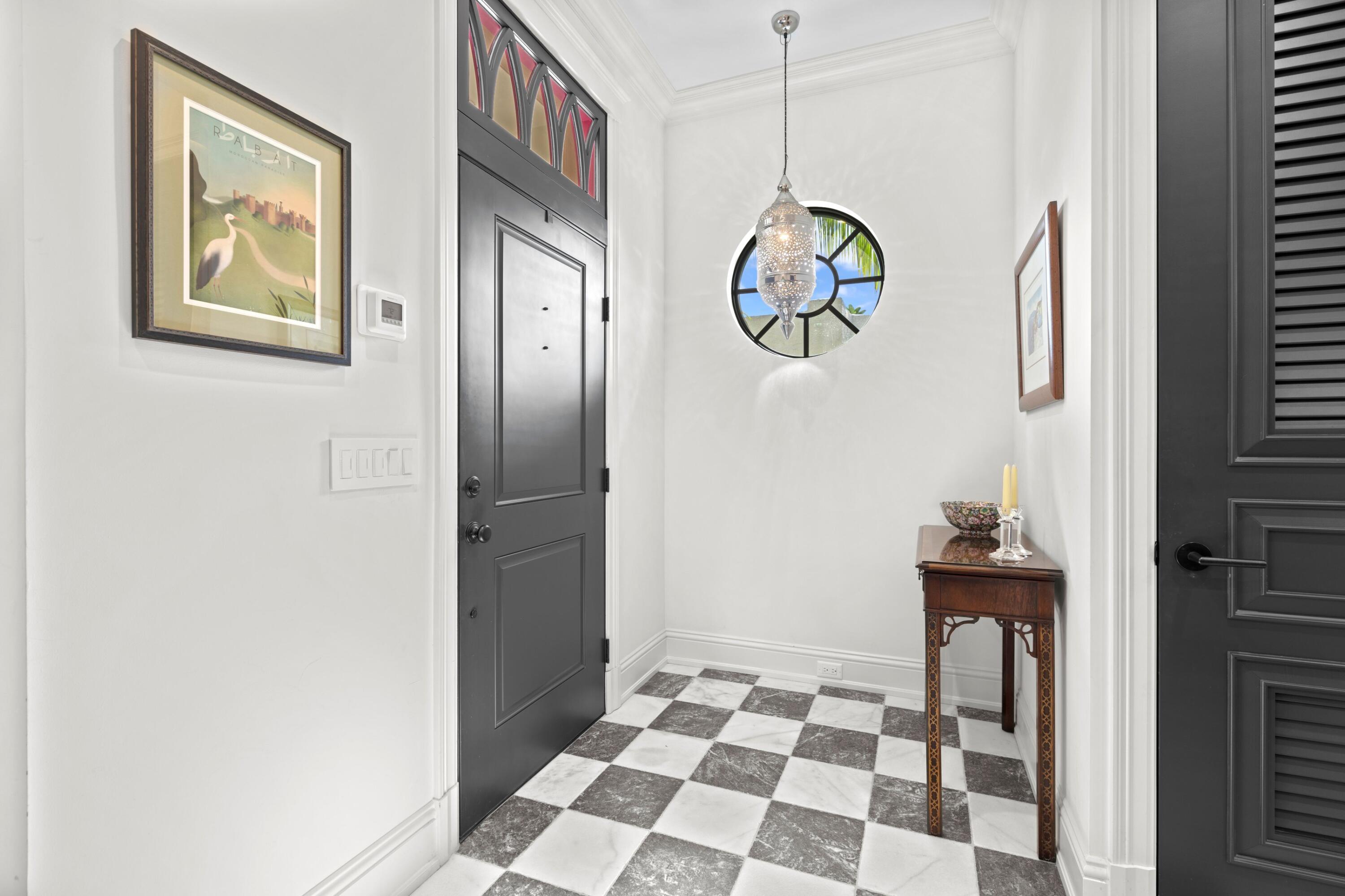 533 Westwood Road West Palm Beach, FL 33401 - Photo 6 of 43 a view of a hallway with front door