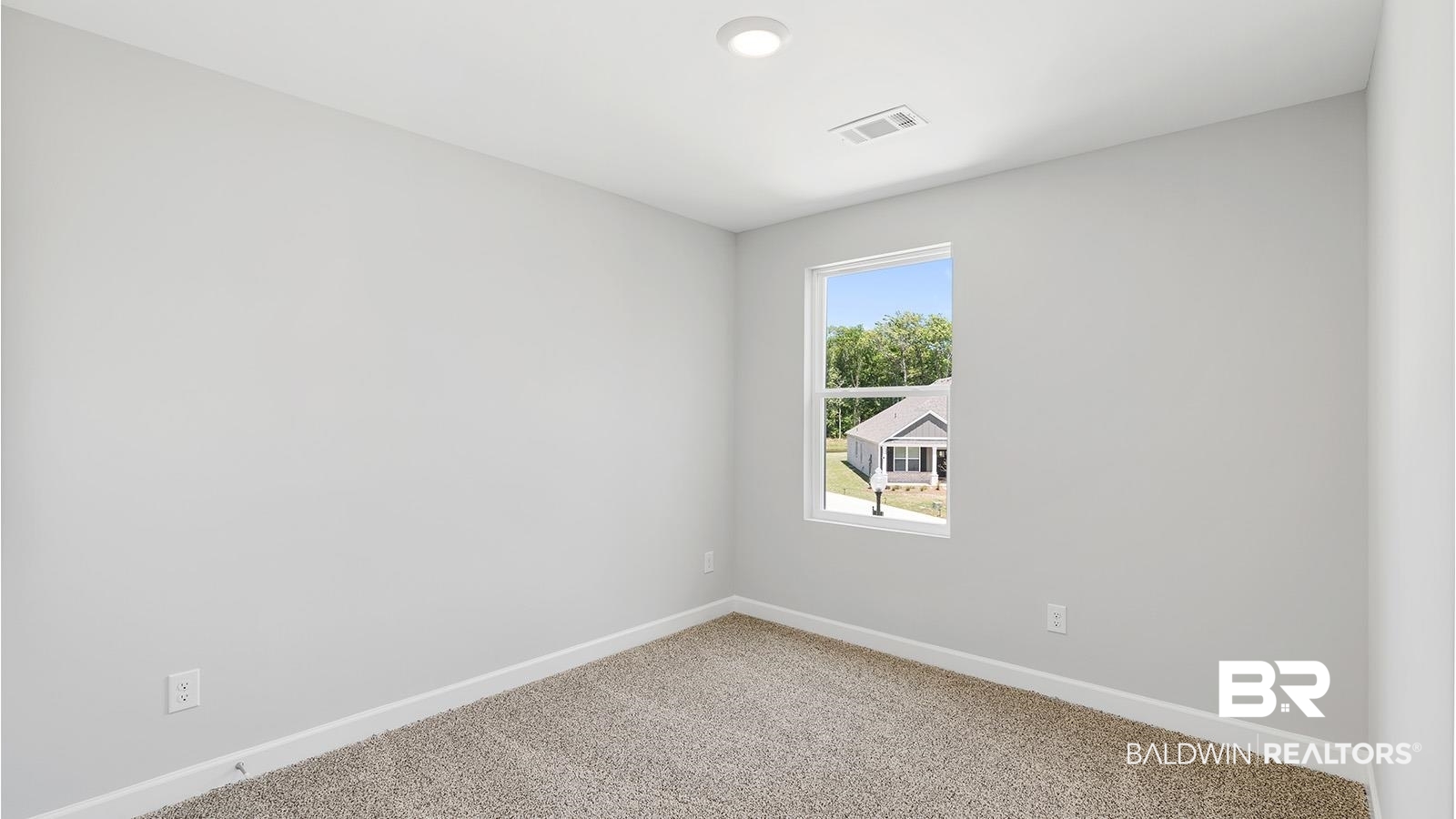 30567 Asheville Road Daphne, AL 36527 - Photo 19 of 29 Unfurnished room featuring baseboards and carpet