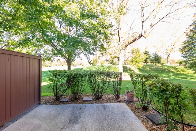 a backyard of a house with lots of green space