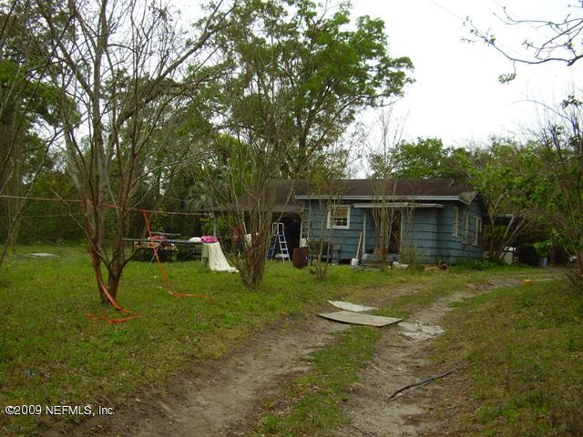 1087 Cahoon Road South Jacksonville, FL 32221 - Photo 1 of 1 a view of a backyard of the house