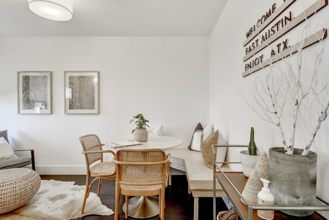 2901 Glen Rae Street, Unit A Austin, TX 78702 - Photo 14 of 36 a view of a dining room with furniture and wooden floor